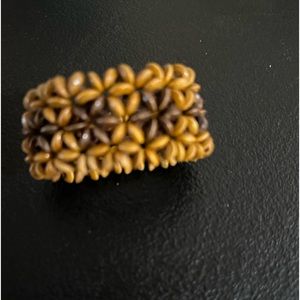 Bracelet Wooden Flower Pattern. Preowned good condition.